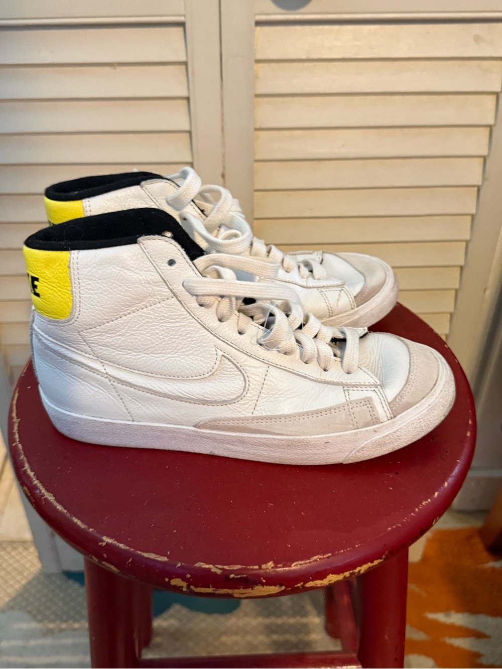 Nike White High-Top Sneakers with Yellow Heel Accent